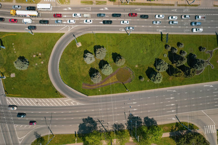 Directly above view of road with traffic, road infrastructure. Resolving of car traffic jam.