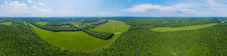 Aerial Caucasus forest panoramic background, green fieldsの写真素材