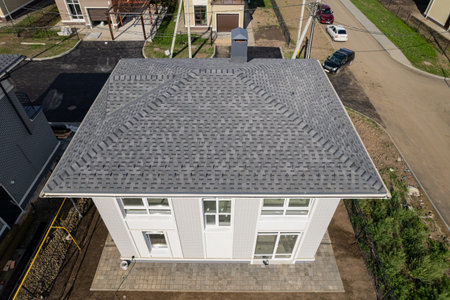 Shingles texture - close up view of asphalt roofing shinglesの写真素材