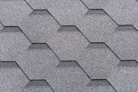 Shingles texture - close up view of asphalt roofing shinglesの写真素材