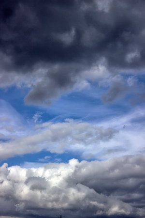 rain clouds on blue sky
