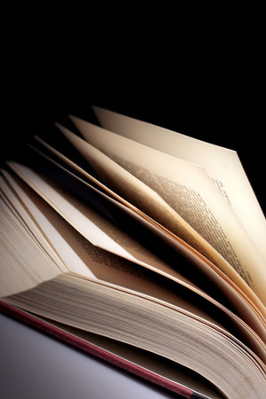 open book, dim lighting for effect