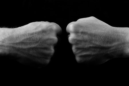 clenched tense fistsの写真素材