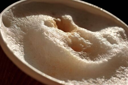 frothy coffee in disposable cup,recycle.の写真素材