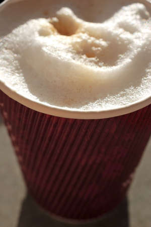 frothy coffee in disposable cup,recycle.の写真素材