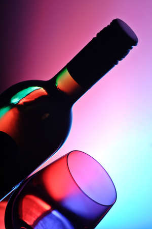 glass and bottle of white wineの写真素材