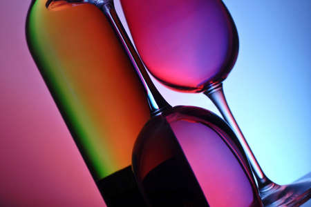 wine and glasses with ambient lightingの写真素材