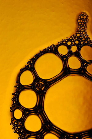 bubbles in an empty textured glass bottle