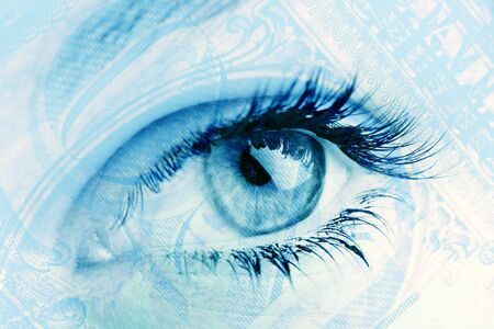 dollar bill and female eye, concept of financial visionの写真素材