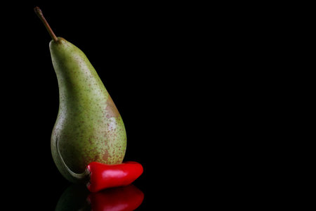 sweet pear with red hot chilliの写真素材