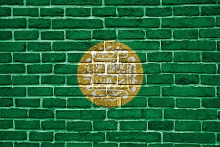 Rohingya flag painted on a brick wall, Background textureの写真素材