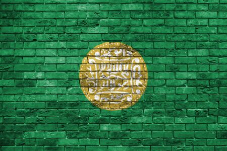 Rohingya flag painted on a brick wall, Background textureの写真素材