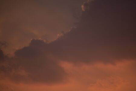 Sunset, sunrise with clouds, light rays and other dramatic effect.の写真素材