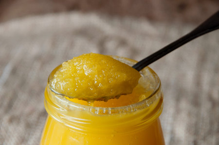 Flower, lime honey in a glass jar