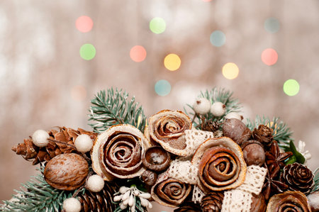 New Year's decoration handmade on the background of a New Year's garlandの写真素材