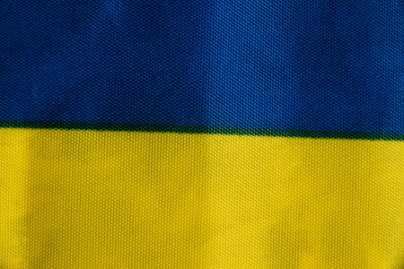 Blue and yellow fabric close-up, like the flag of Ukraine.の写真素材