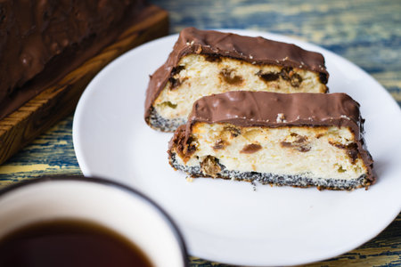 Delicious chocolate dessert, cheesecake with raisins and poppy seeds. Lviv cheesecake, a traditional...