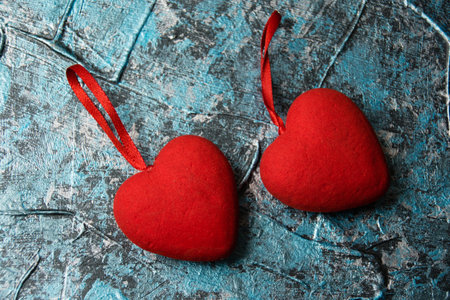 Valentine's Day, red hearts on a blue background.の写真素材