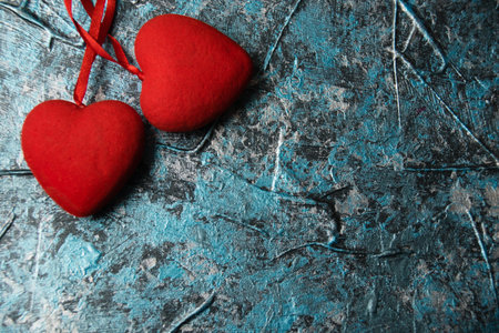 Valentine's Day, red hearts on a blue background.の写真素材