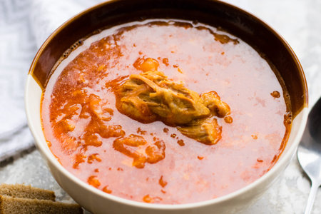 Delicious and aromatic red soup with meat, Ukrainian borscht. Traditional Ukrainian dish, cuisine.