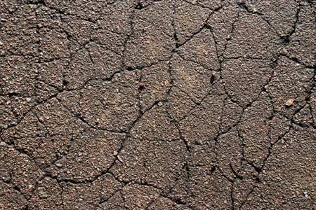 Cracks on old asphalt, texture of old asphalt.