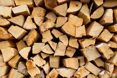 Pile of wood logs ready for winter. Wood texture.の写真素材