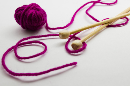 Knitting needles and balls of wool yarn isolated on white background. Knitting accessories for Handmade.Knitting needles and balls of wool yarn isolated on white background. Knitting accessories for Handmade.の写真素材