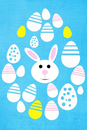 Easter background with colored eggs and rabbit. Greeting card for Easter in March 2016.の写真素材