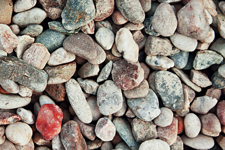 Background of pebbles. Texture building shingle.の写真素材