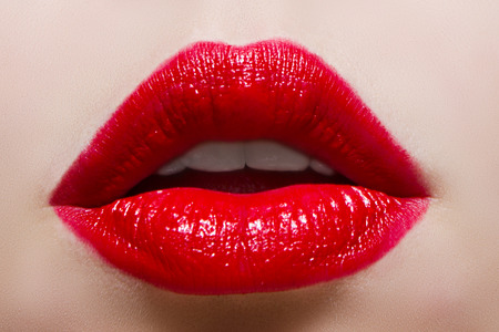 Close up beauty photo with red lips. Red lipstick.の写真素材