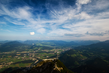 The view from Untersberg mountain in Salzburg, Austria. Beautiful landscape with mountains and bright blue sky in a sunny day.の写真素材