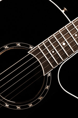 Classical guitar closeup - includes strings, fingerboard and part of the body. Can be used as a nice...