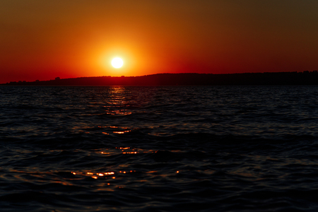 Red sunset over the sea, river Volgaの写真素材