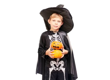 Studio portrait of little boy in Halloween costume against white backgroundの写真素材