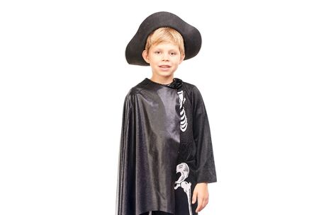 Studio portrait of little boy in Halloween costume against white backgroundの写真素材