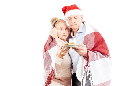Portrait of cute senior couple celebrating Christmasの写真素材