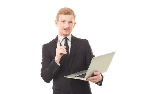 Portrait of manager holding open laptop on white backgroundの写真素材