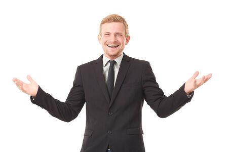 Portrait of young businessman in black suit on white backgroundの写真素材