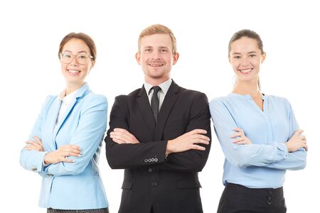 Portrait of young business team consisting of two women and man on white backgroundの写真素材