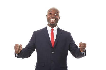 Portrait of African businessman in formal suit posing on white backgroundの写真素材