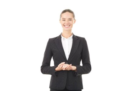 Portrait of beautiful young businesswoman smiling on white backgroundの写真素材