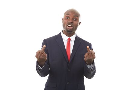 Portrait of African businessman in formal suit posing on white backgroundの写真素材