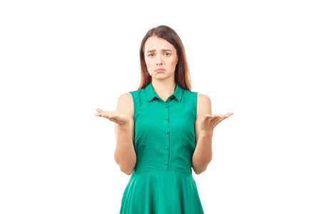 Portrait of emotional young woman in emerald green dress on white backgroundの写真素材