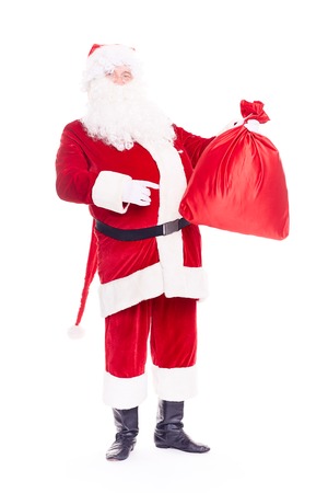 Portrait of Christmas character Santa Claus in traditional costume with red sack on white backgroundの写真素材
