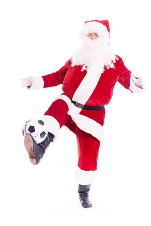 Portrait of Santa Claus playing soccer ball on white backgroundの写真素材