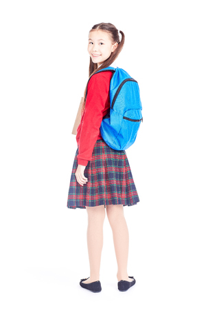 Portrait of beautiful Asian female student wearing school uniform and blue backpackの写真素材
