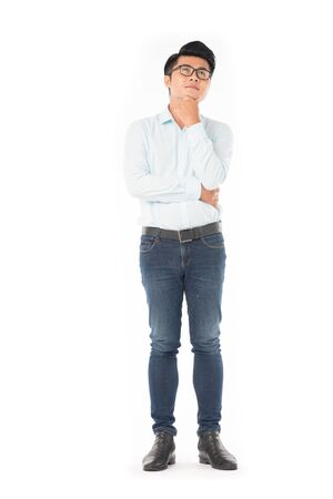 Portrait of young Asian businessman wearing eyeglasses on white backgroundの写真素材