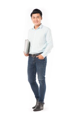 Portrait of adult Asian student holding booksの写真素材
