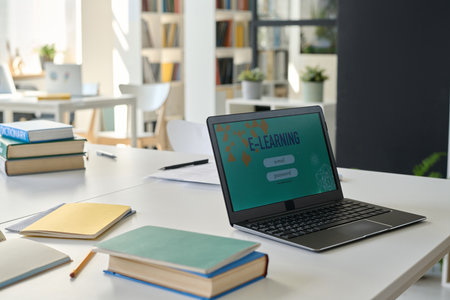 Close-up of laptop with educational program on screen for online education in classroomの写真素材