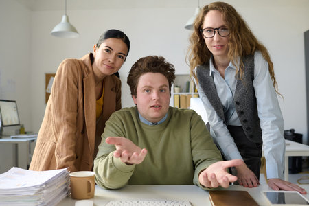 Group of business colleagues discussing working moments during video call on computer